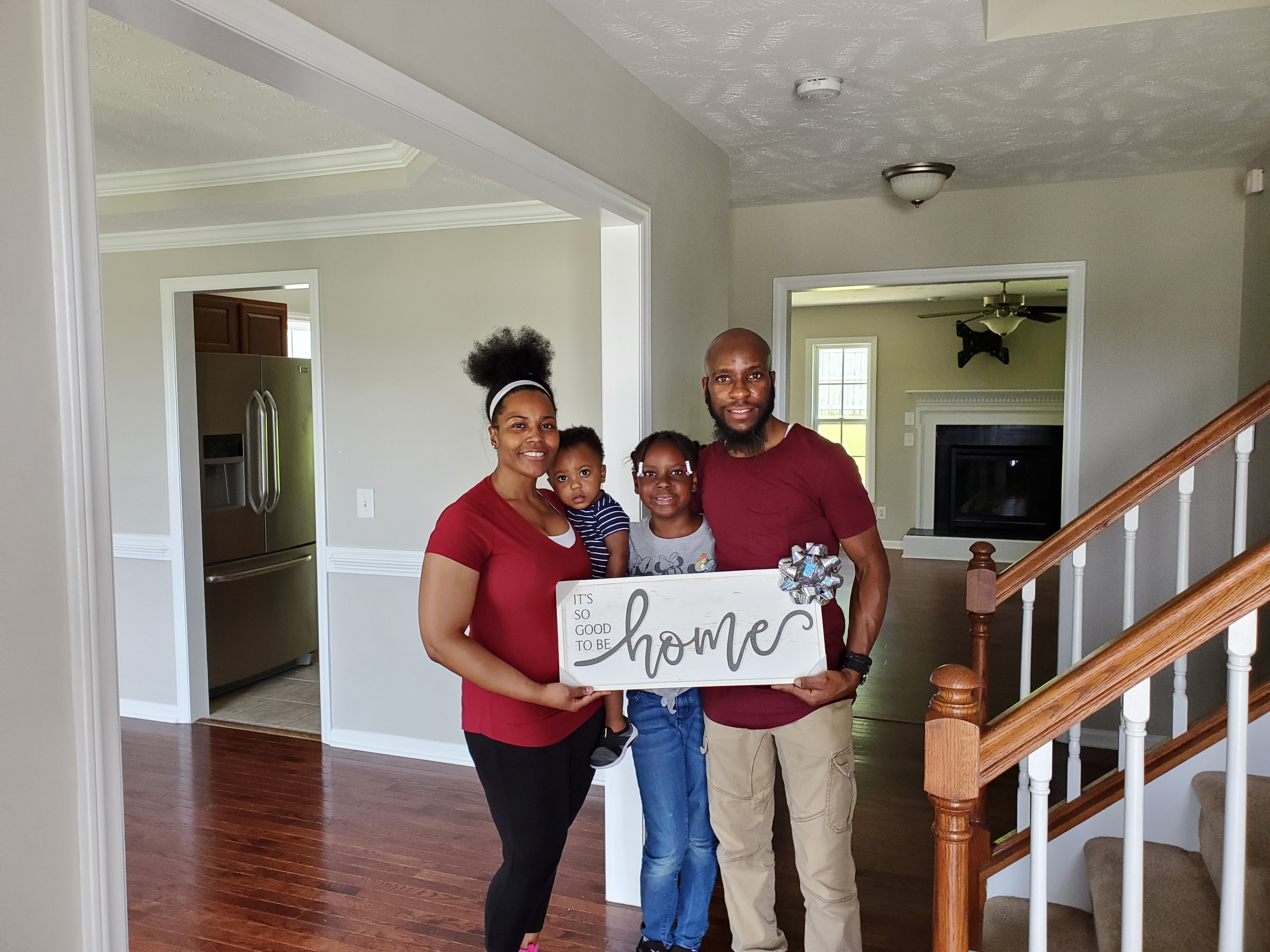 Happy family in their new home